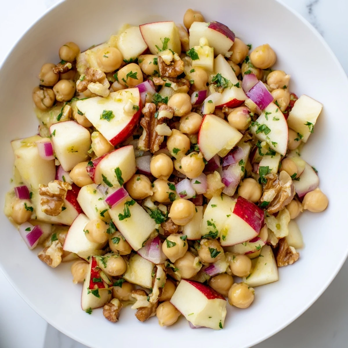 Crisp apples and crunchy walnuts in this Fall Harvest Apple and Chickpea Salad; a fall favorite for sure.