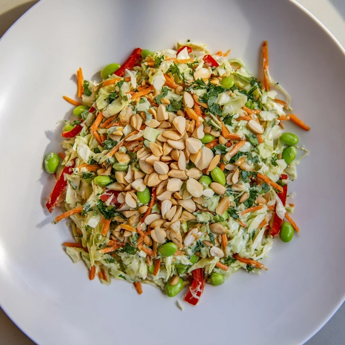 Crisp green cabbage combines with edamame in this delicious Crunchy Cabbage and Edamame Salad.