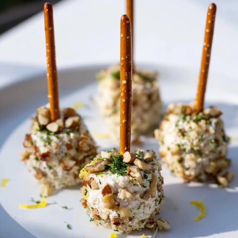 Champagne Cork Cheese Balls, festive appetizer with creamy cheese, herbs, and Champagne, ready to serve.